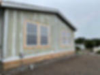 Home exterior renovation project in a gallery.
