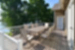Enjoy outdoor dining for eight overlooking the lakeshore