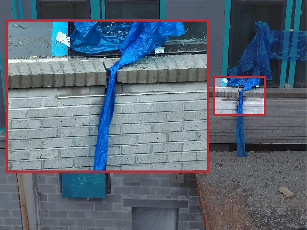 Cracked brick on building window sill
