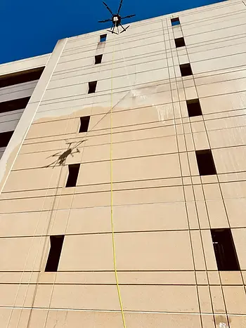 Drone cleaning building facade
