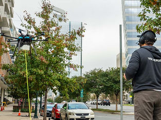 VSI Aerial pilot cleaning building with a cleaning drone