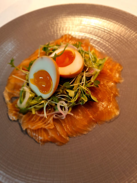 Smoked salmon with ponzu cured egg served at a private chef dining experience