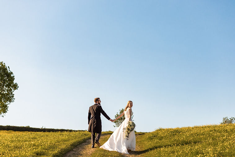 Bride and groom in golden hour at Longbourn Estate Barn Wedding