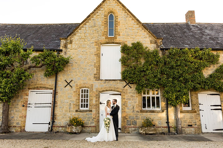 Bride and groom at Longbourn Estate Barn wedding