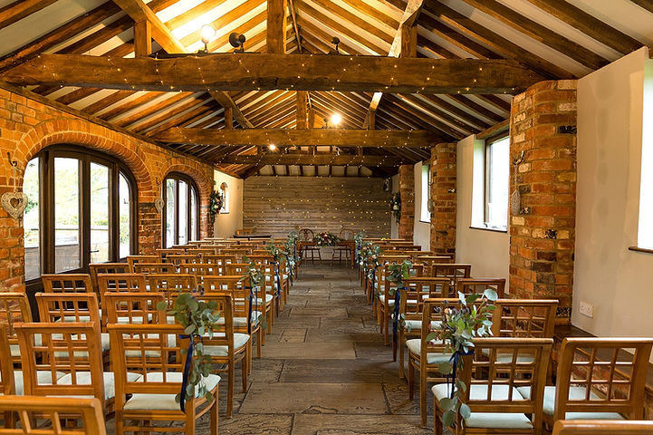 Courtyard Barn set for a ceremony at Dodmoor House