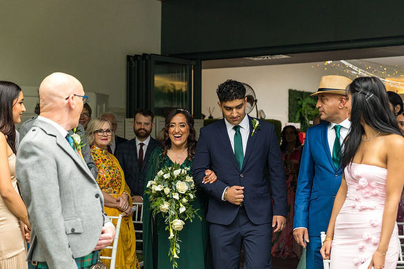 Wedding ceremony at Riverside Glass House in Jephson Gardens in Leamington Spa