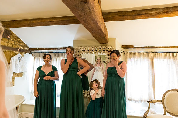 Bridesmaids reaction to seeing the bride