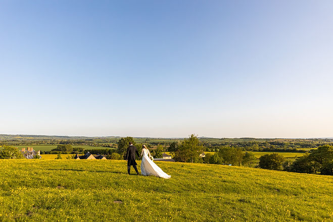 Bride and groom in golden hour at Longbourn Estate Barn Wedding