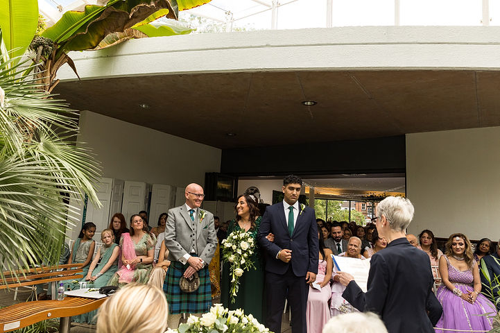 Wedding ceremony at Riverside Glass House in Jephson Gardens in Leamington Spa