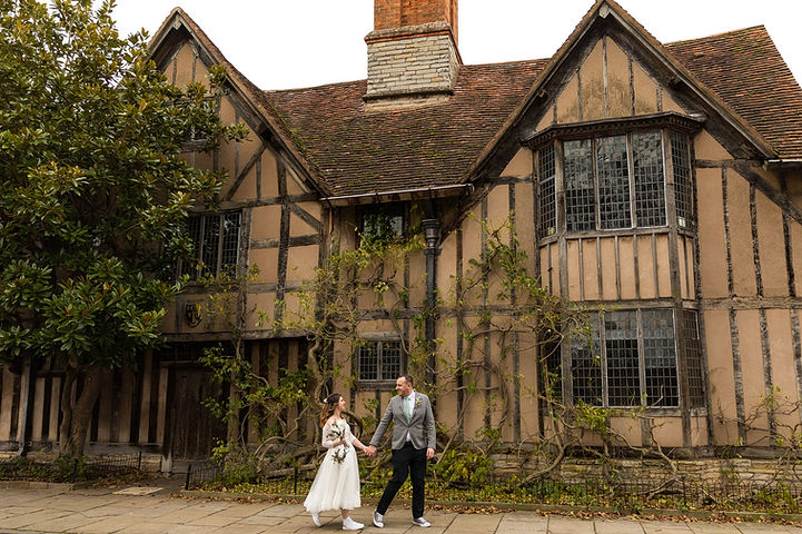 Couple pose outside Hall's Croft in Stratford-upon-Avon