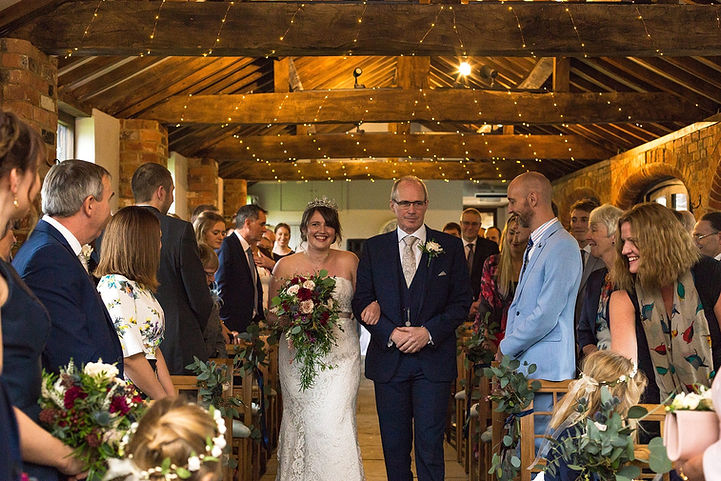 Bride is walked down the aisle by her father at Dodmoor House