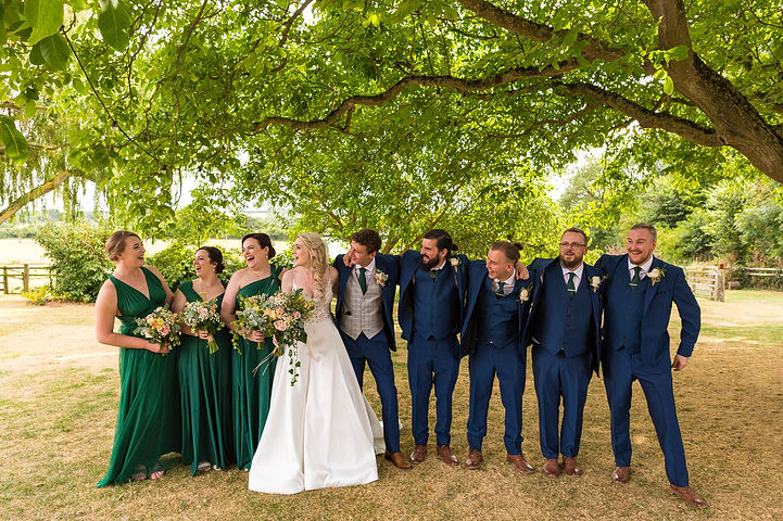 Wedding party in the gardens at Crockwell Farm