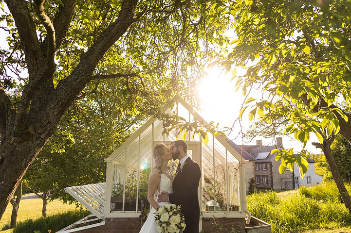 Bride and groom in golden hour at Longbourn Estate Barn Wedding