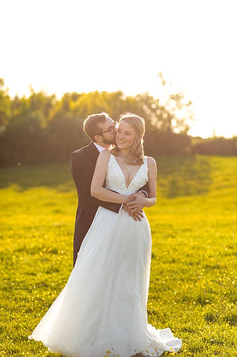 Bride and groom in golden hour at Longbourn Estate Barn Wedding