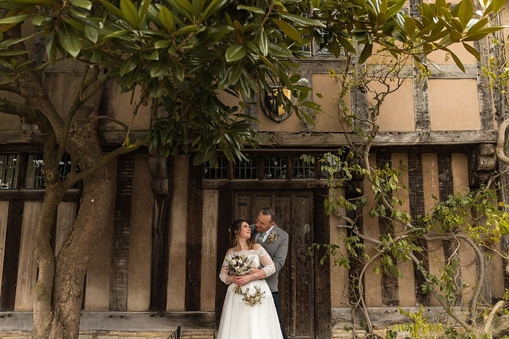 Couple pose outside Hall's Croft in Stratford-upon-Avon