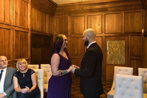 Ring exchange during a ceremony at St Johns House in Warwick