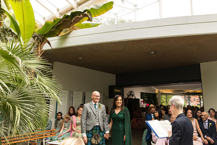 Wedding ceremony at Riverside Glass House in Jephson Gardens in Leamington Spa