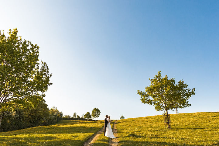 Bride and groom in golden hour at Longbourn Estate Barn Wedding