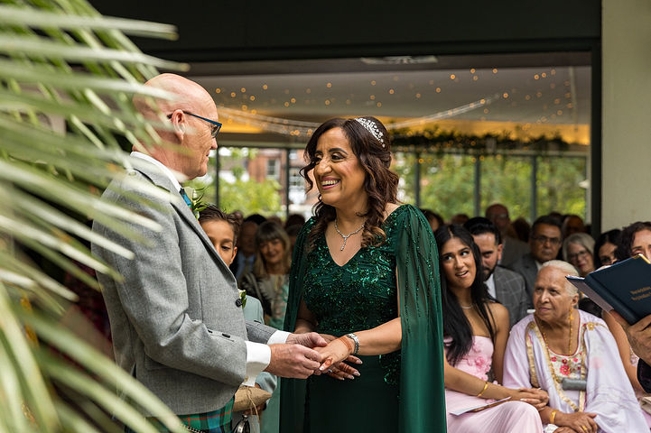 Wedding ceremony at Riverside Glass House in Jephson Gardens in Leamington Spa