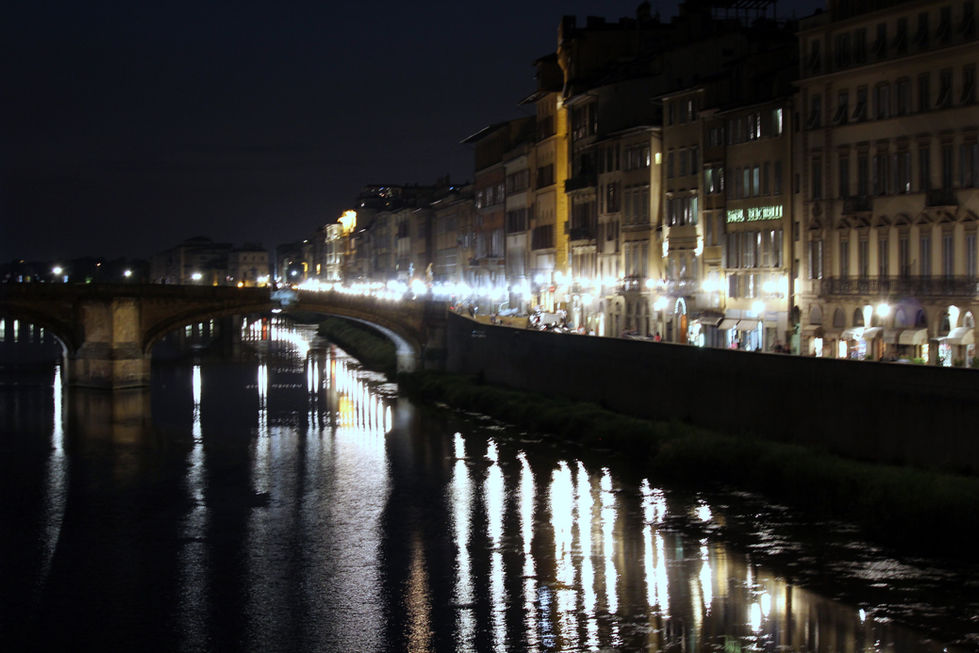 photograph of Arno river, Florence, Italy , at night