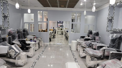 Renovated beauty salon, flooring, and modern finishes in Charlotte, NC.