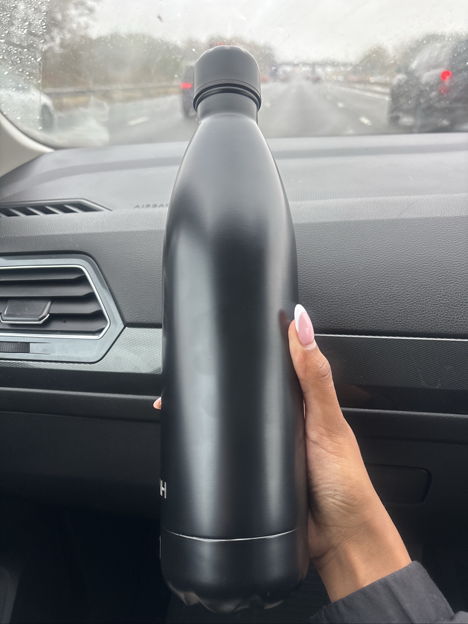 Gourde isotherme noire en acier inoxydable