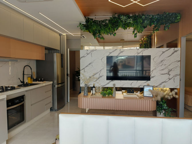 Sala de estar integrada à cozinha em apartamento decorado de 40 m² no Infinity Vila Matilde.