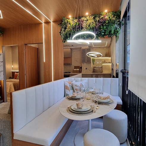 Sala de jantar de apartamento decorado de 40 m² no Condomínio Infinity Vila Matilde, com canto alemão planejado para otimizar o espaço e integrar conforto e funcionalidade.