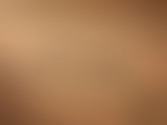 Close-up of kraft cardboard food packaging featuring the text "EN 13432" in dark green with horizontal and vertical lines.