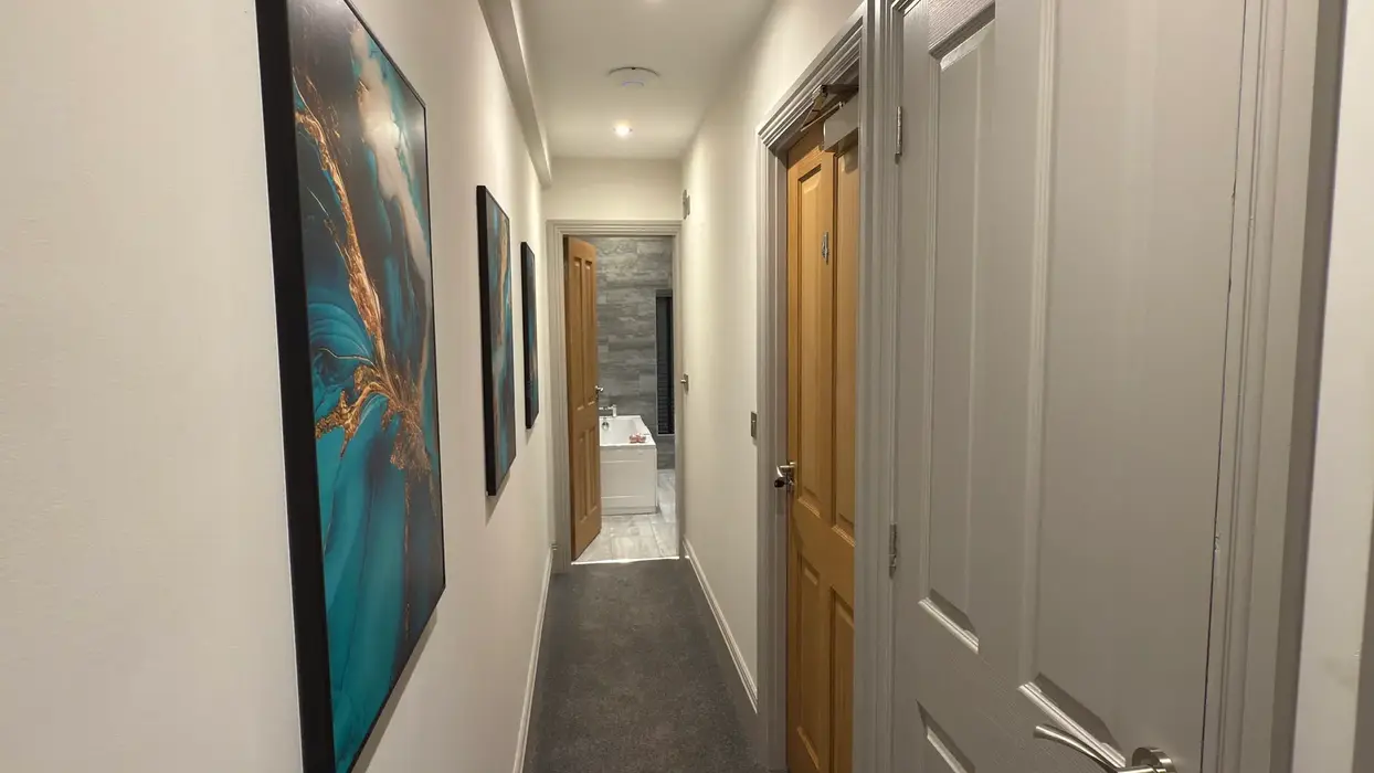 Student house landing area featuring artwork.