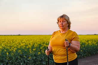 Yellow woman walking.png