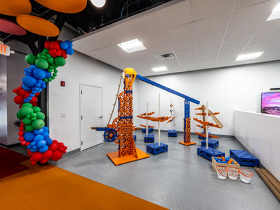 Science and discovery exhibit installation within a commercial non-profit space.