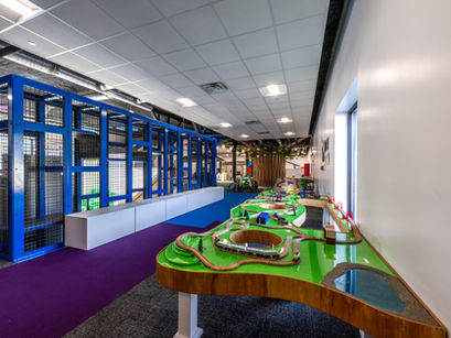 Custom play structure construction and interior finish work for a children's museum.