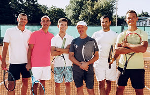 group-six-male-tennis-players-standing-court.jpg