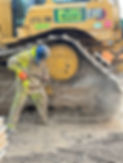 Oleksy Services pressure washing a bulldozer and heavy equipment in Algonquin and nearby areas
