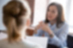 Confident focused businesswoman, teacher or mentor coach speaking to business people at ne