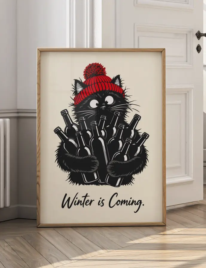 Affiche Chat et Vin Winter Is Coming encadrée dans un intérieur, décoration murale humoristique.