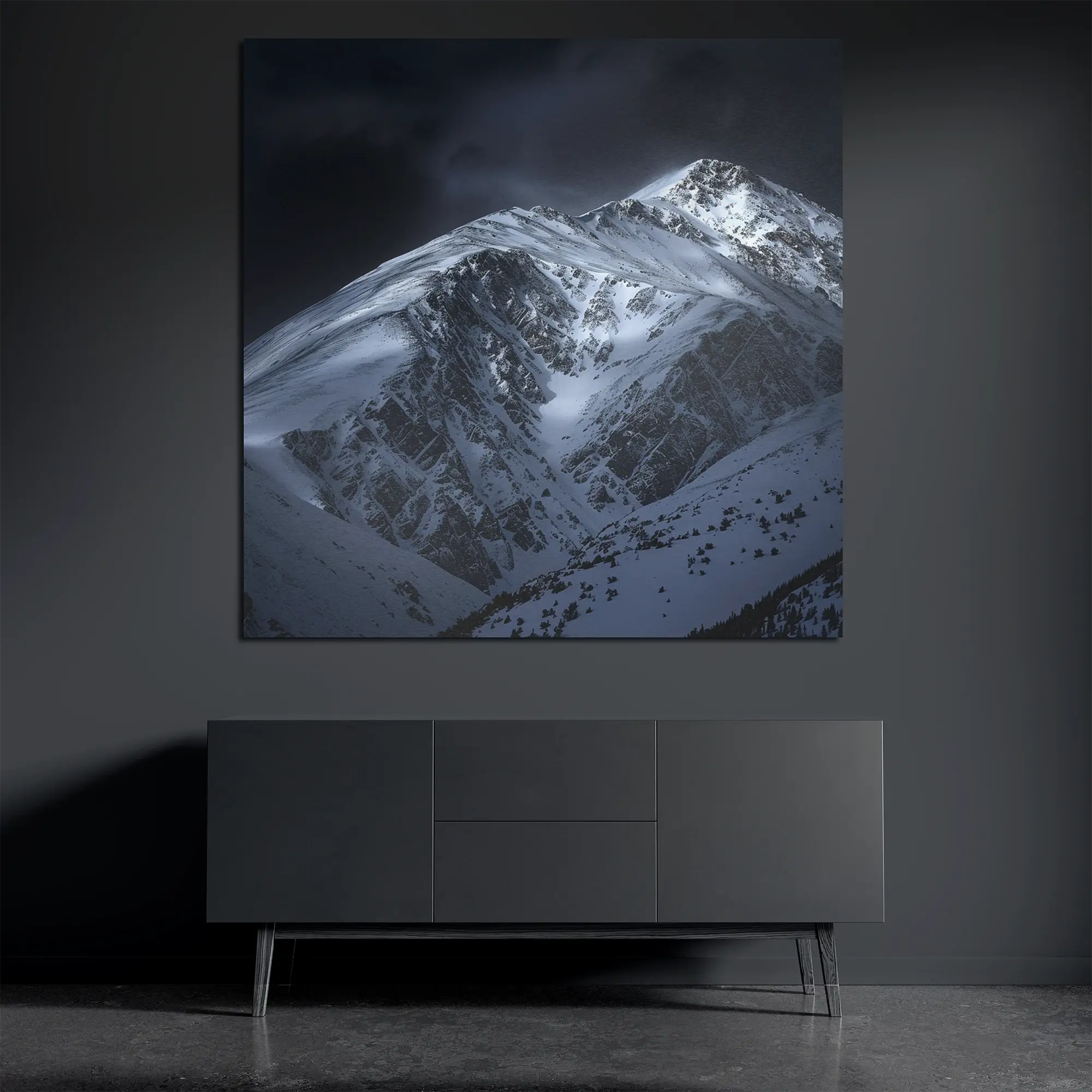 Snow mountain metal wall art on brushed aluminum above dark console