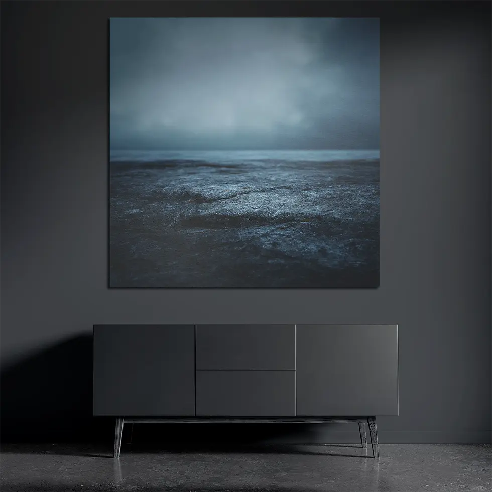 Minimal ocean metal wall art on brushed aluminum above dark console