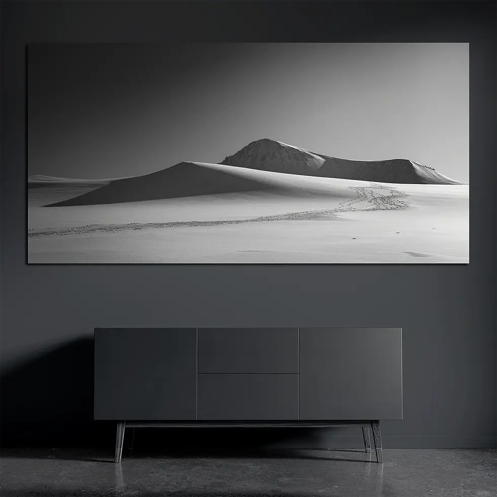 Panoramic brushed aluminum wall art with minimal alpine ridge on dark wall