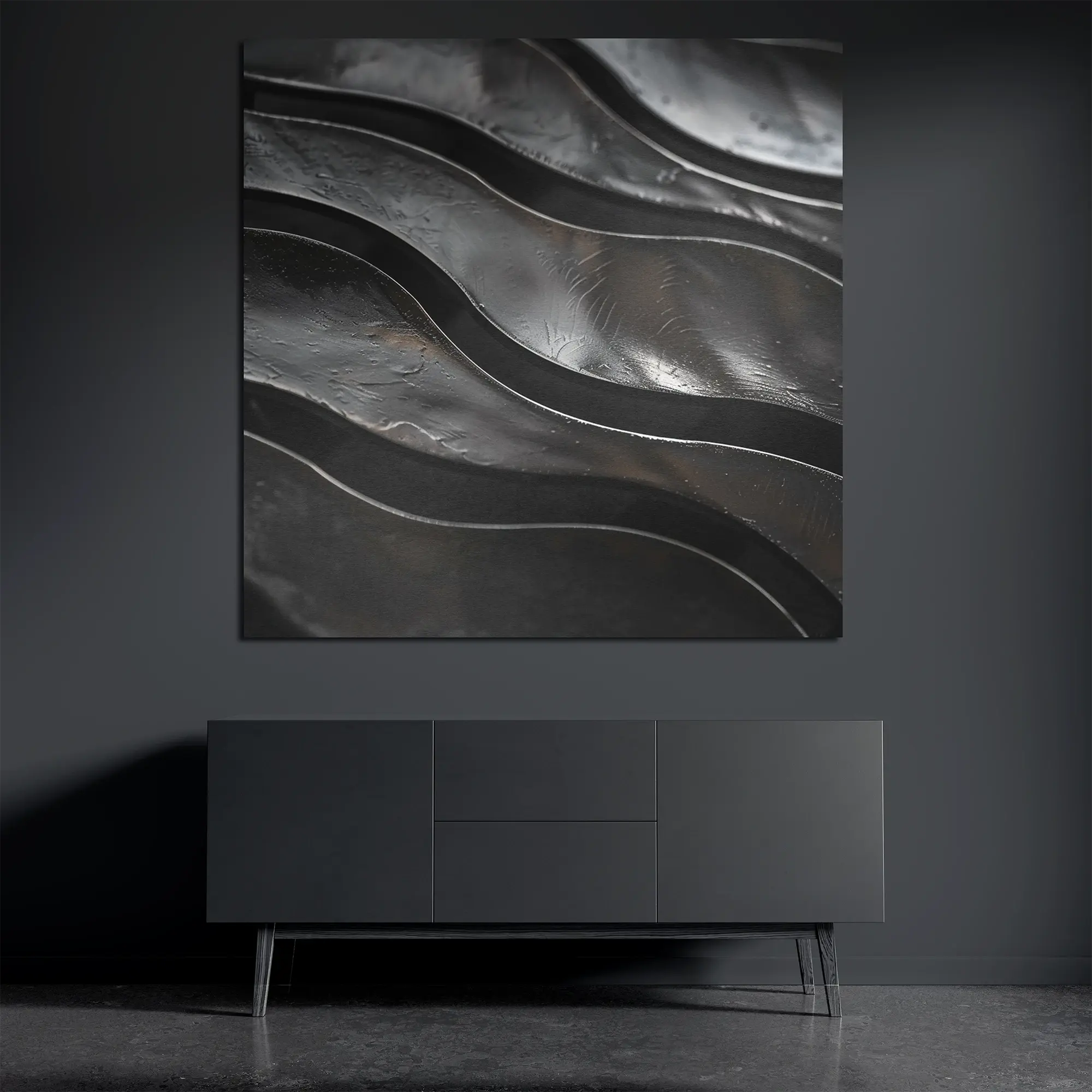 Panoramic metal wall art on brushed aluminum above dark console