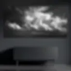 Thumbnail: Black and white storm cloud metal wall art on brushed aluminum above dark console