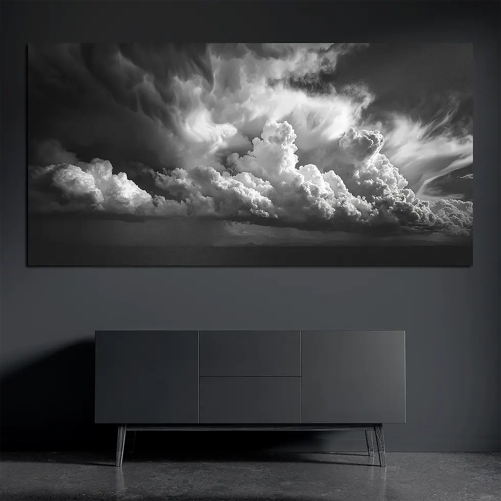 Black and white storm cloud metal wall art on brushed aluminum above dark console