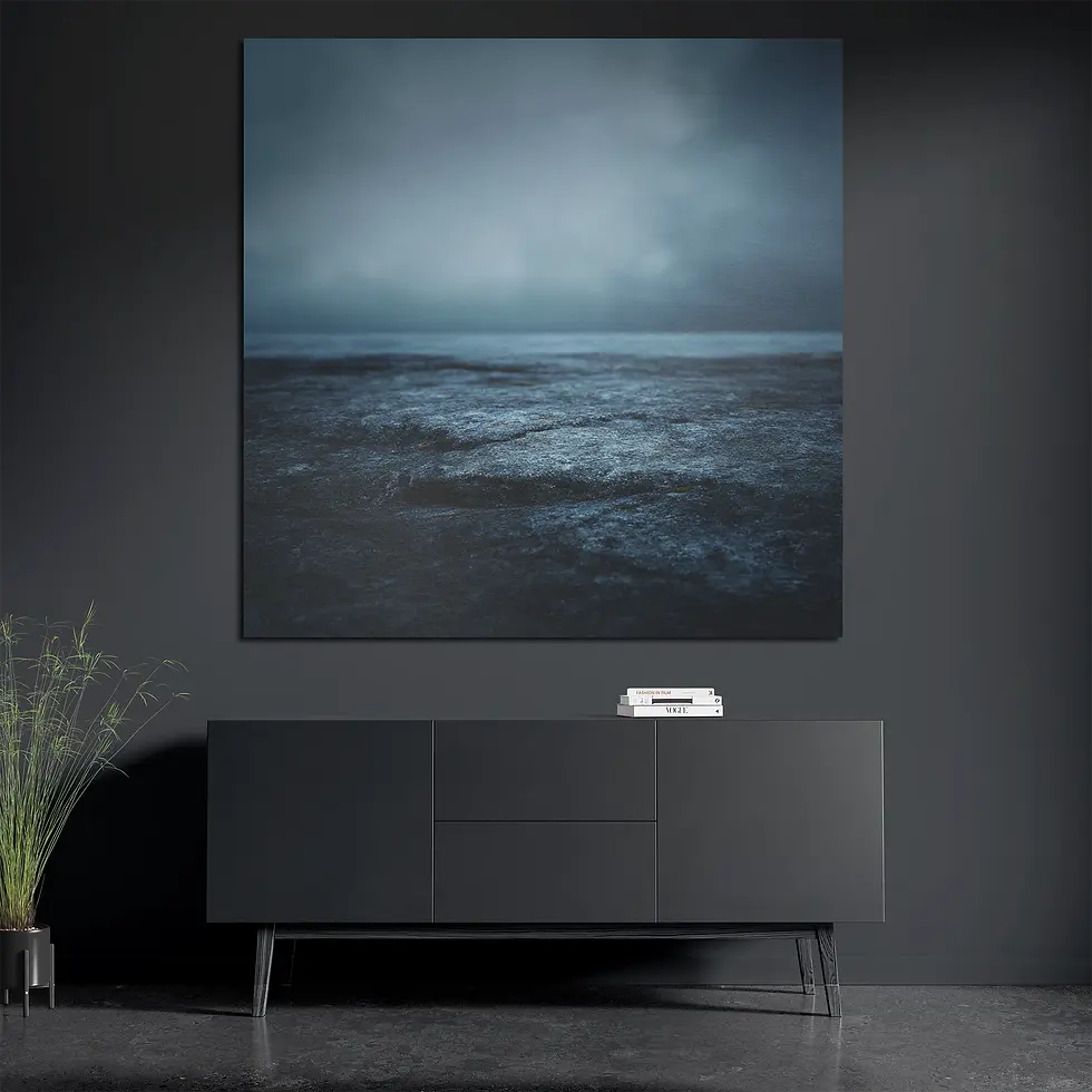 Square moody seascape print styled with books and plant