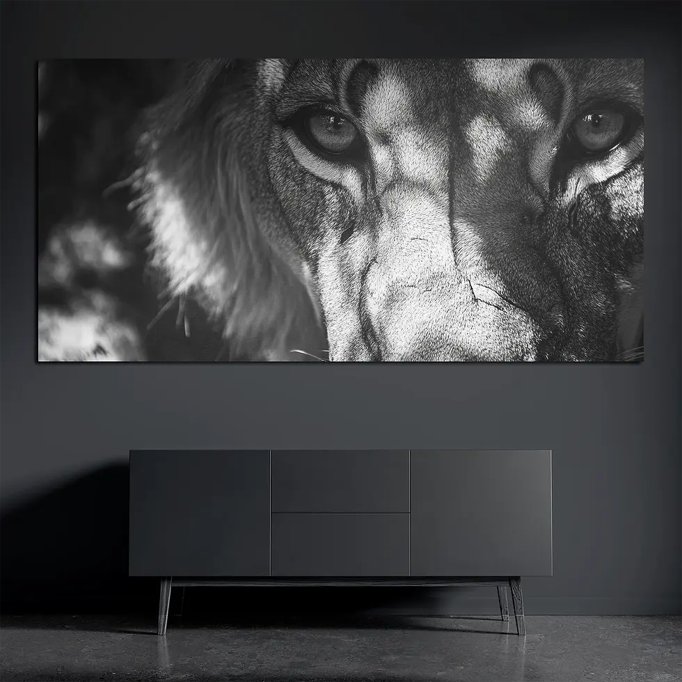 Black and white lion metal wall art on brushed aluminum above dark console