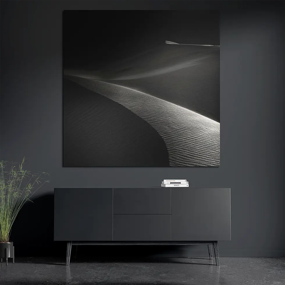 Square black sand print styled with books and plant