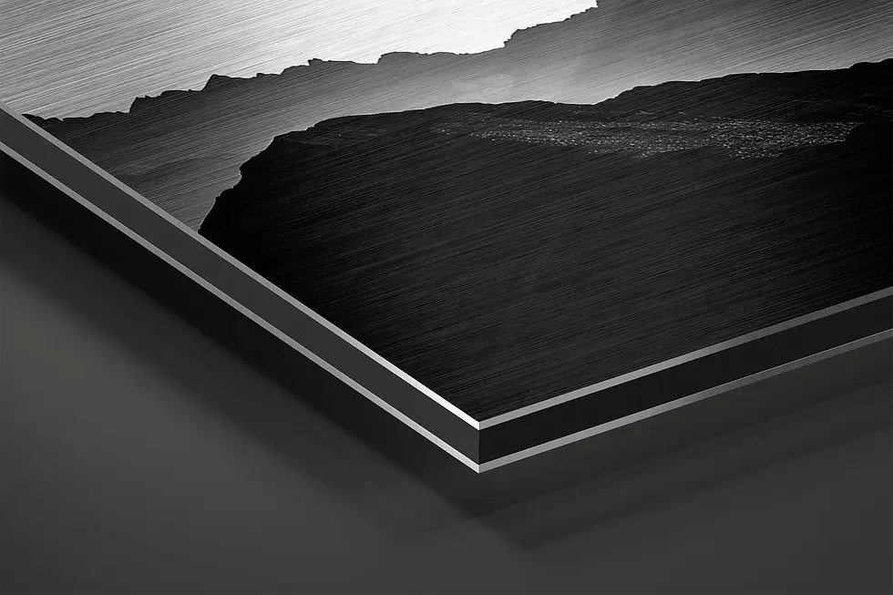 Thumbnail: Close-up of brushed aluminum metal print showing layered mountain ridge silhouettes