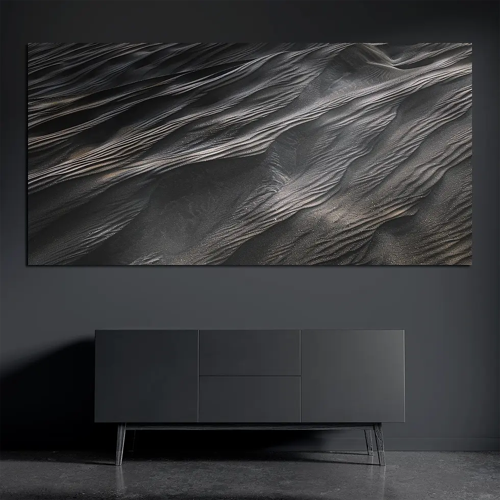 Panoramic brushed aluminum wall art with dark layered desert texture on dark wall above console