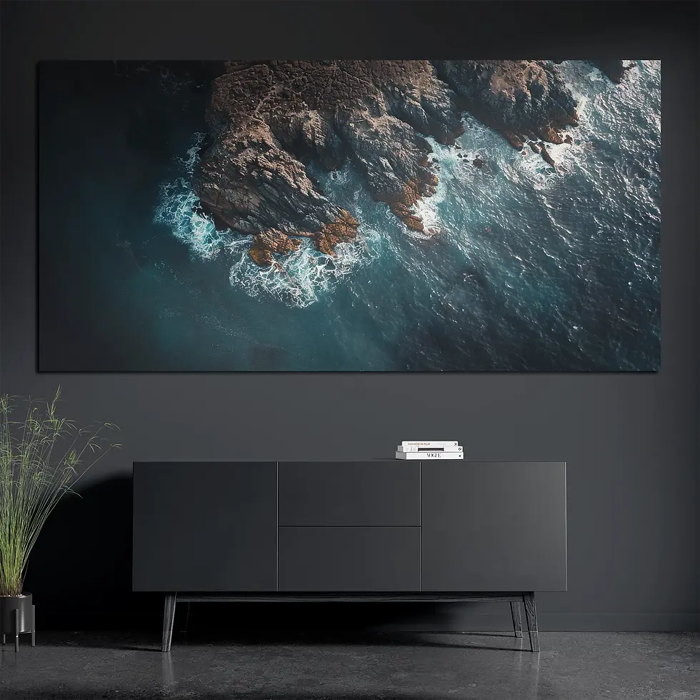 Deep blue ocean metal print styled with books and plant in modern interior