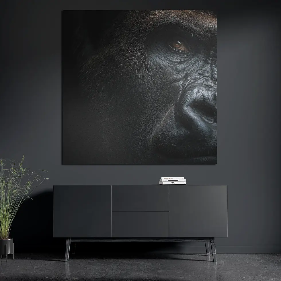 Brushed aluminum metal wall art featuring close-up gorilla portrait above dark console